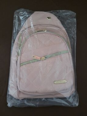 Quilted Light Pink Women's Sling Bag with Gold Accents